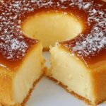 Bolo de Queijadinha no Liquidificador é a receita prática e super fácil de preparar, traz toda a cremosidade e o sabor da tradicional queijadinha.